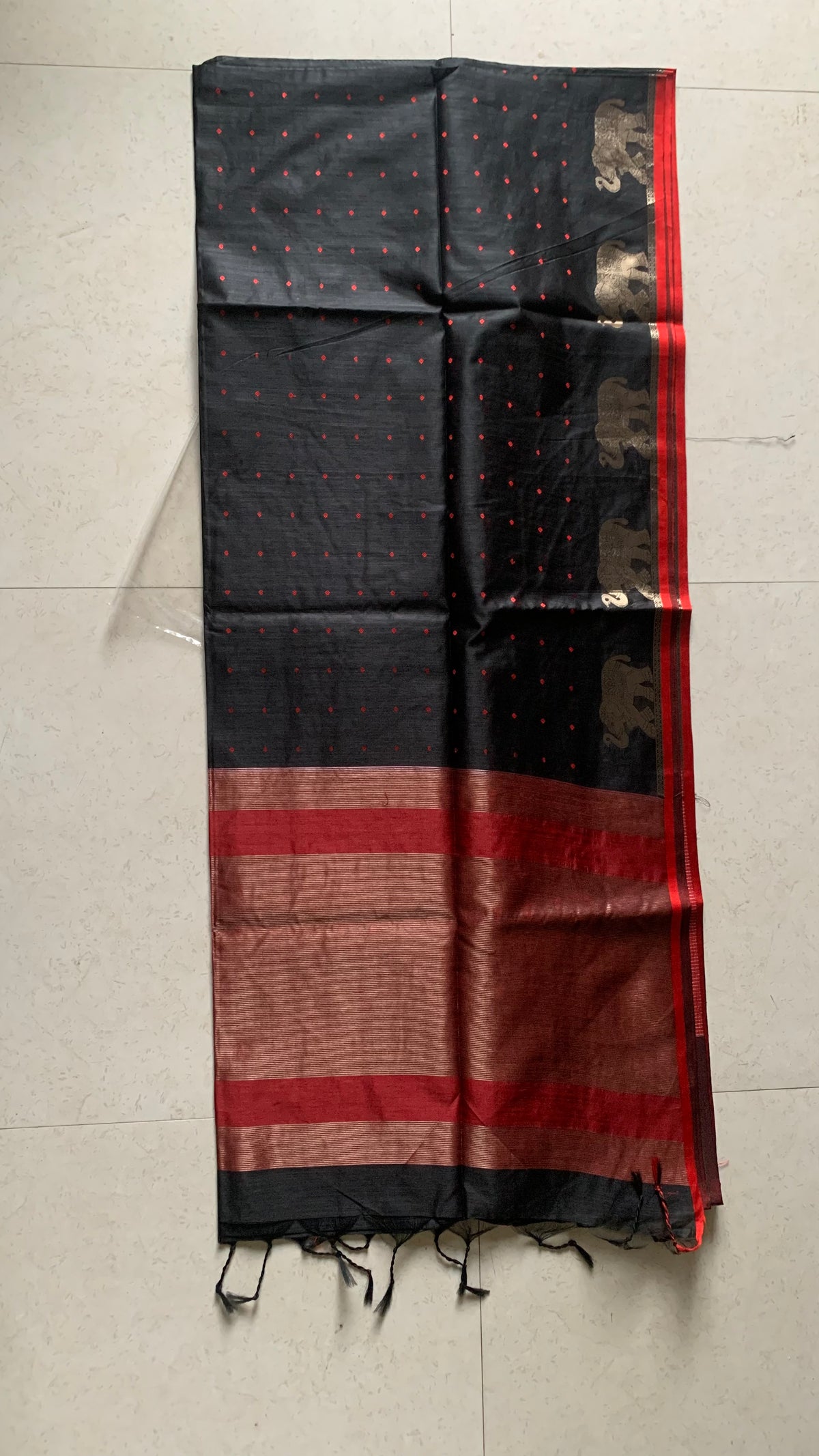 Black Maheshwari Saree with Gold Elephant Motifs, Striped Border & Tassel Details