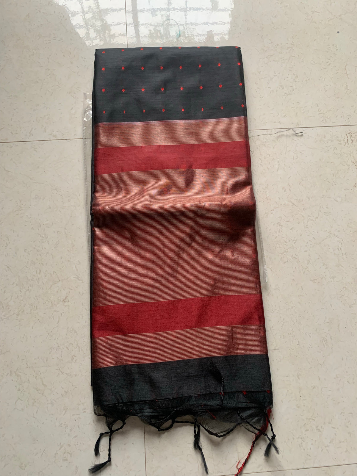 Black Maheshwari Saree with Gold Elephant Motifs, Striped Border & Tassel Details