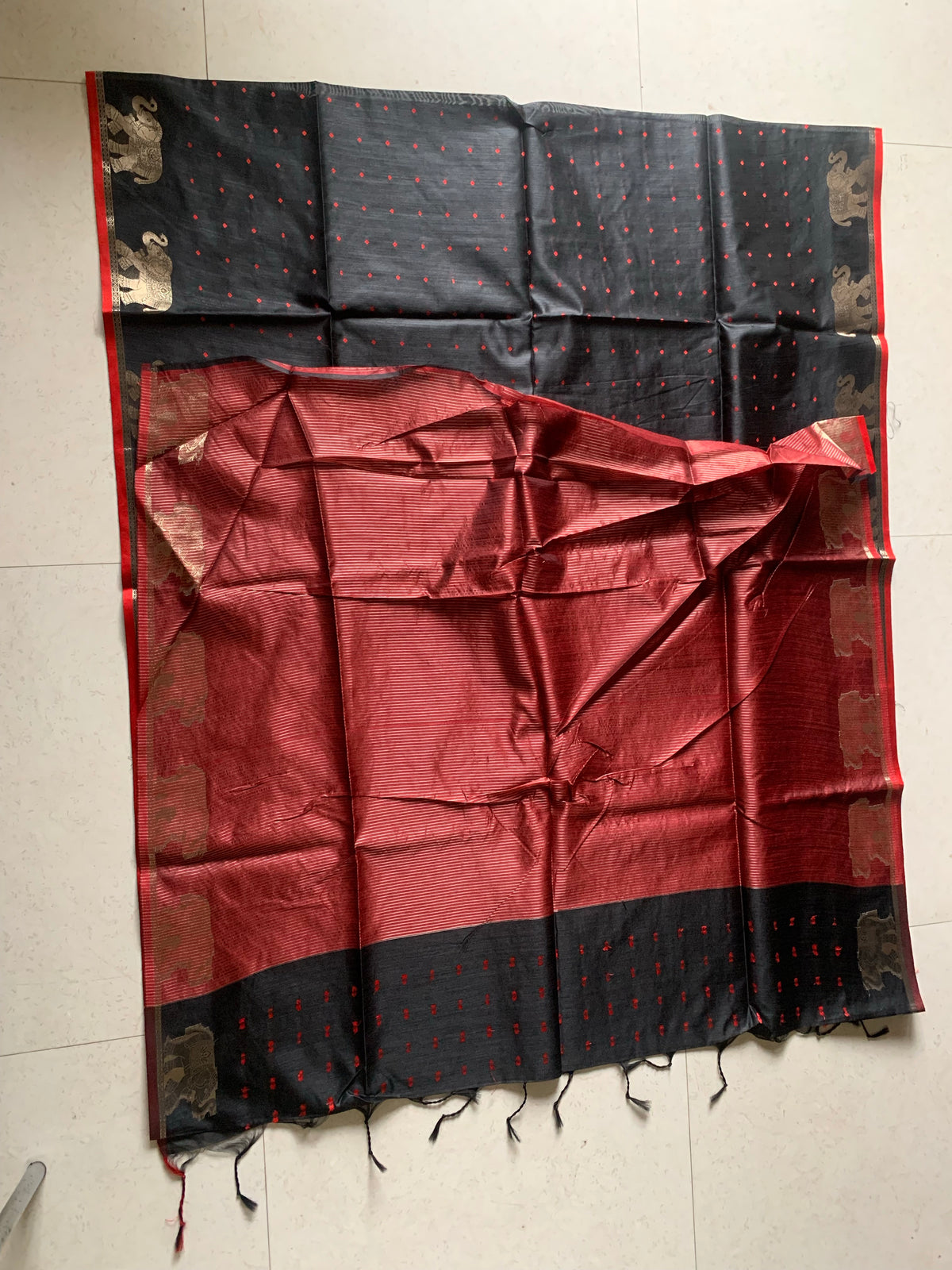 Black Maheshwari Saree with Gold Elephant Motifs, Striped Border & Tassel Details