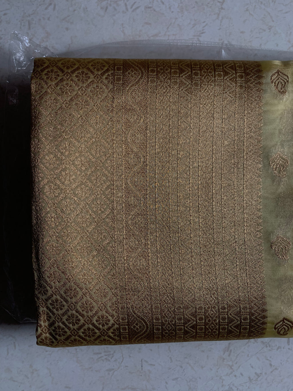 Golden Organza Designer Saree with Paisley Motifs and Intricate Patterned Border