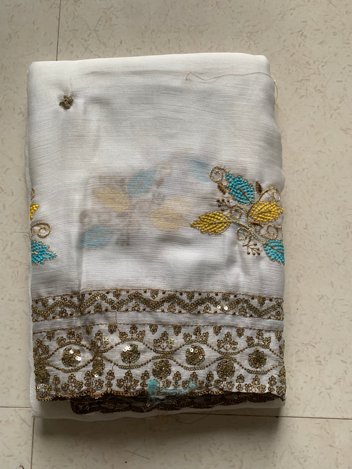 White Embroidered Georgette Saree with Gold Sequin Border & Multicolor Floral Motifs