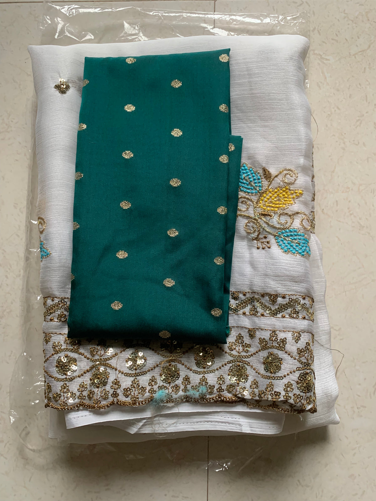 White Embroidered Georgette Saree with Gold Sequin Border & Multicolor Floral Motifs