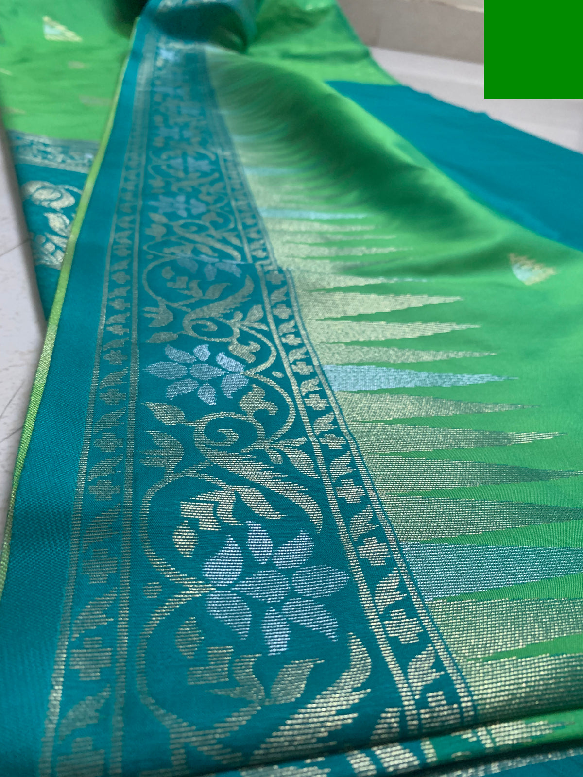Green Silk Kathpadar Saree with Teal Blue Floral Woven Pallu & Gold Motifs