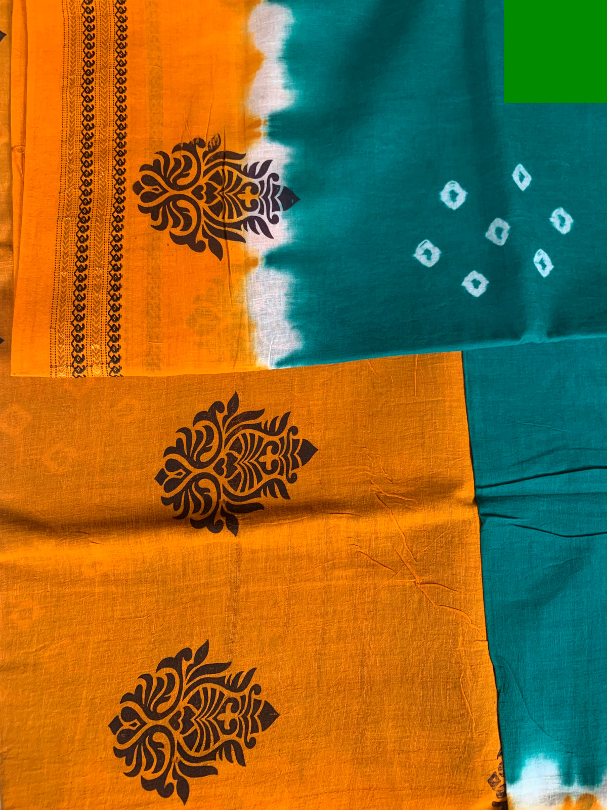 Burnt Orange & Teal Bandhani Saree with Tie-Dye Effect & Floral Motifs
