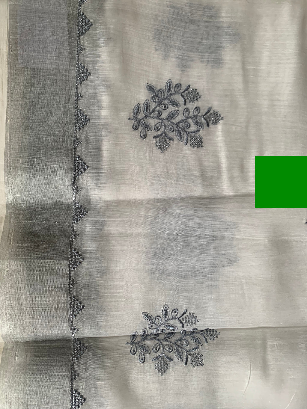 White Linen Saree with Silver-Grey Botanical Embroidery & Tassel Border