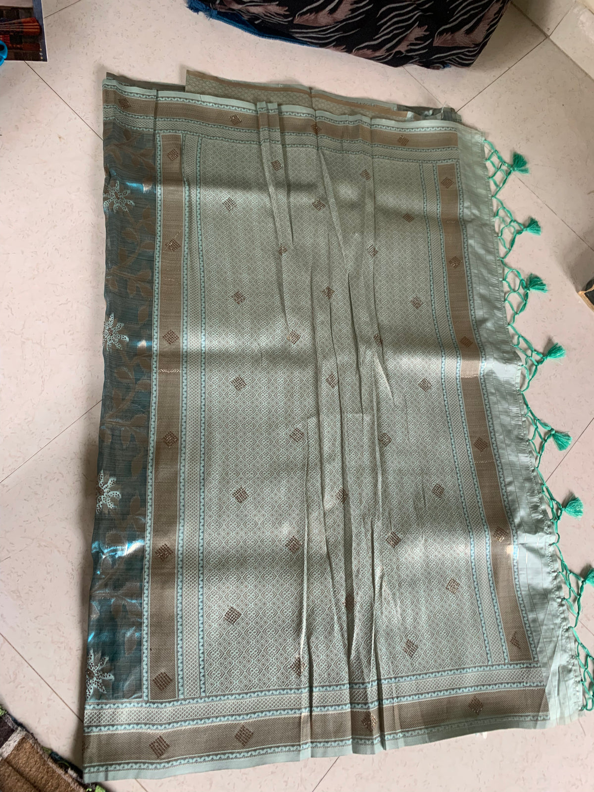 Teal Organza designer Saree with Gold Botanical Vines, Embellished Flowers & Tassels