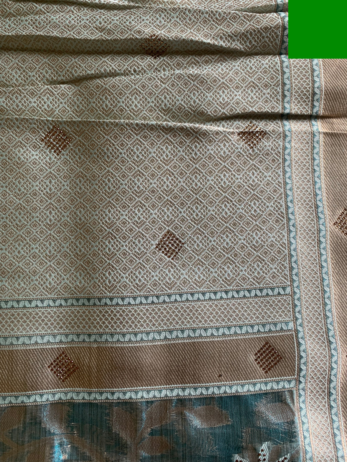Teal Organza designer Saree with Gold Botanical Vines, Embellished Flowers & Tassels