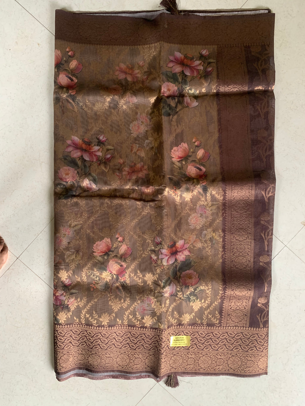 Brown Floral Organza Designer Saree with Woven Border & Tassel Detailing