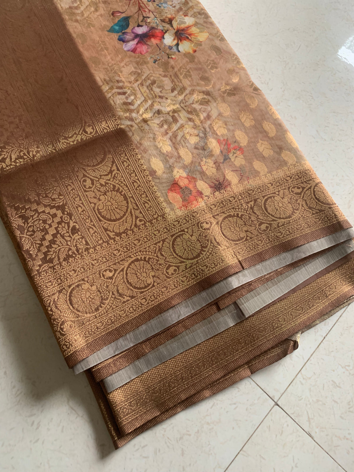 Brown Organza Designer Saree with Floral Print, Gold Motifs & Woven Border