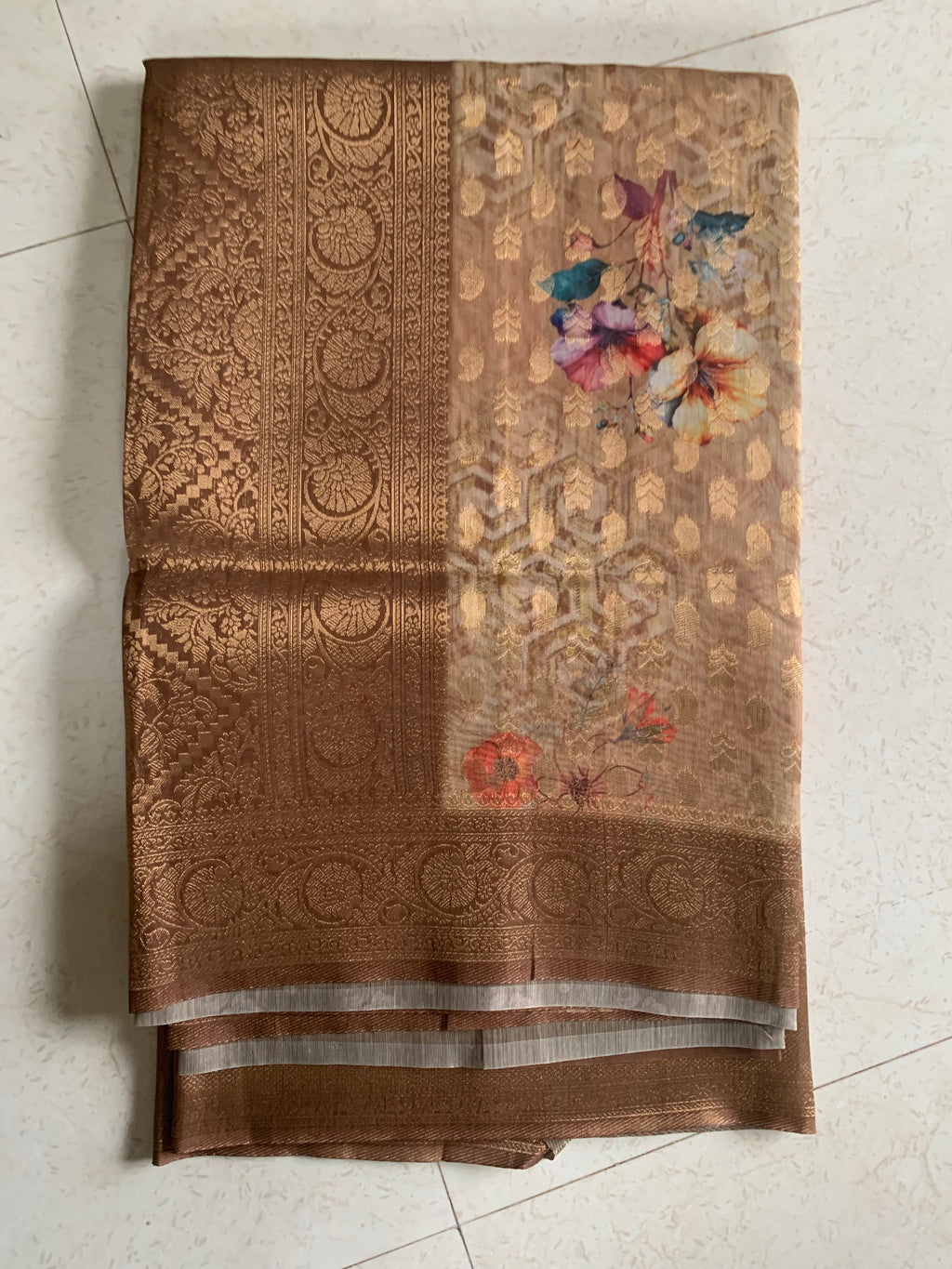 Brown Organza Designer Saree with Floral Print, Gold Motifs & Woven Border