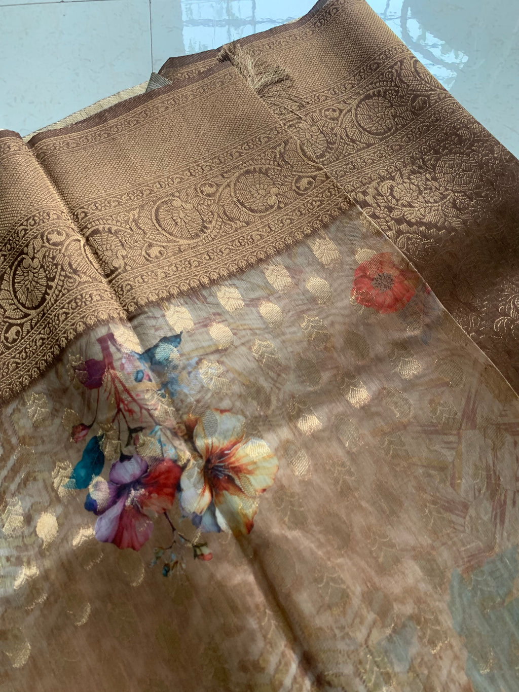 Brown Organza Designer Saree with Floral Print, Gold Motifs & Woven Border