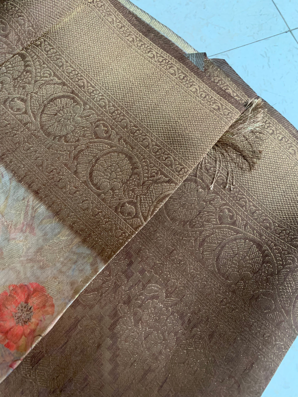 Brown Organza Designer Saree with Floral Print, Gold Motifs & Woven Border