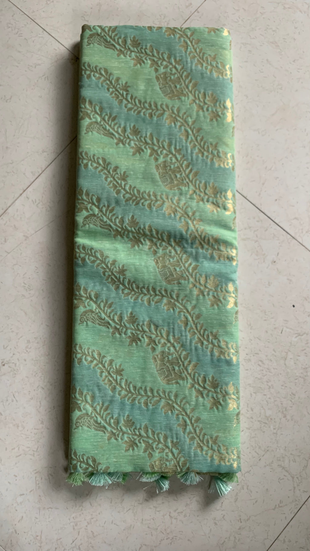 Mint Green Linen Silk Saree with Gold Floral Motifs & Tassel Edge