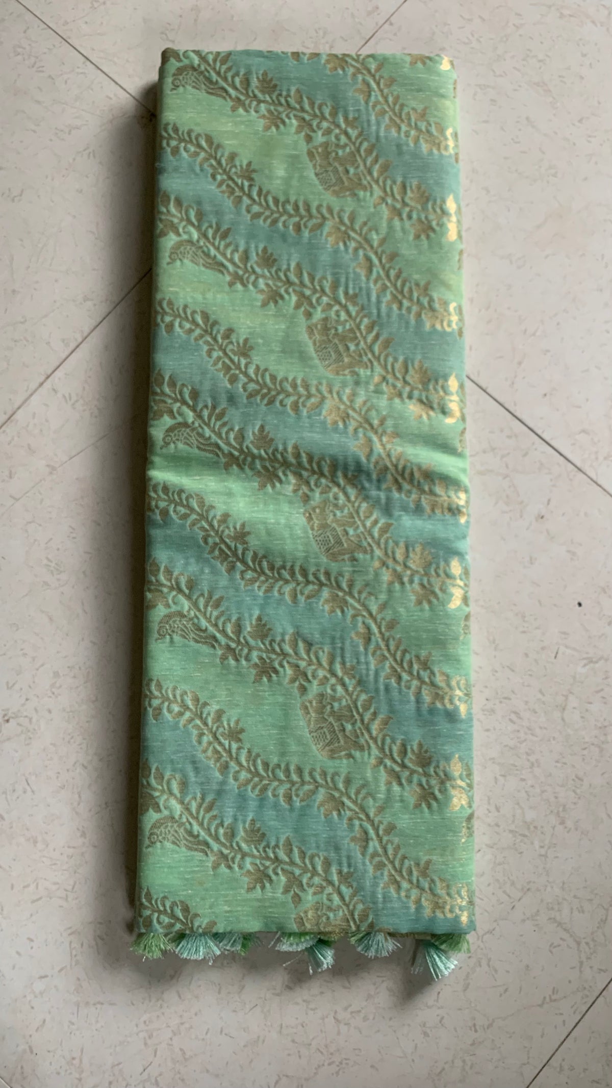 Mint Green Linen Silk Saree with Gold Floral Motifs & Tassel Edge