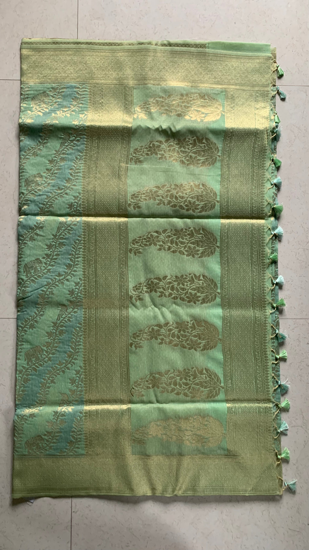 Mint Green Linen Silk Saree with Gold Floral Motifs & Tassel Edge