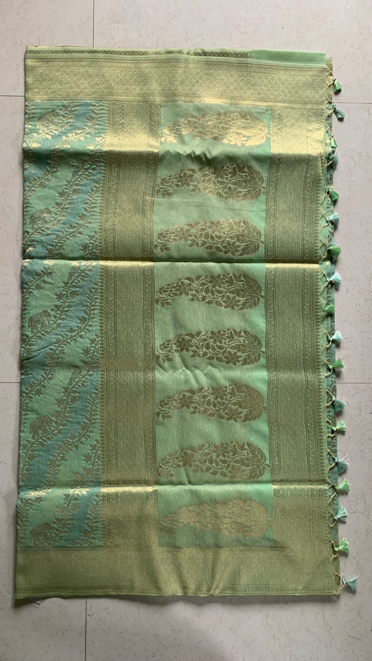 Mint Green Linen Silk Saree with Gold Floral Motifs & Tassel Edge