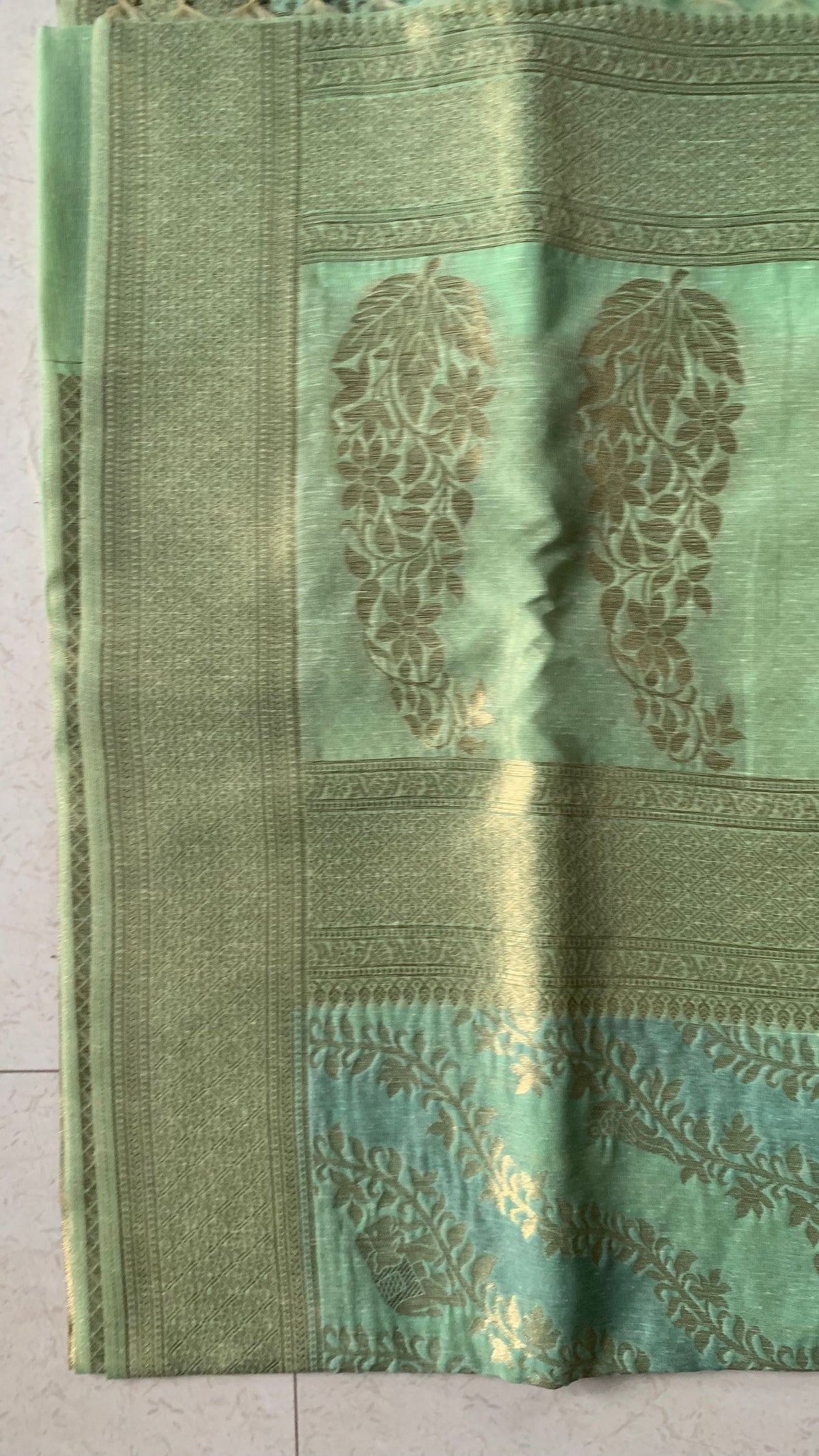 Mint Green Linen Silk Saree with Gold Floral Motifs & Tassel Edge