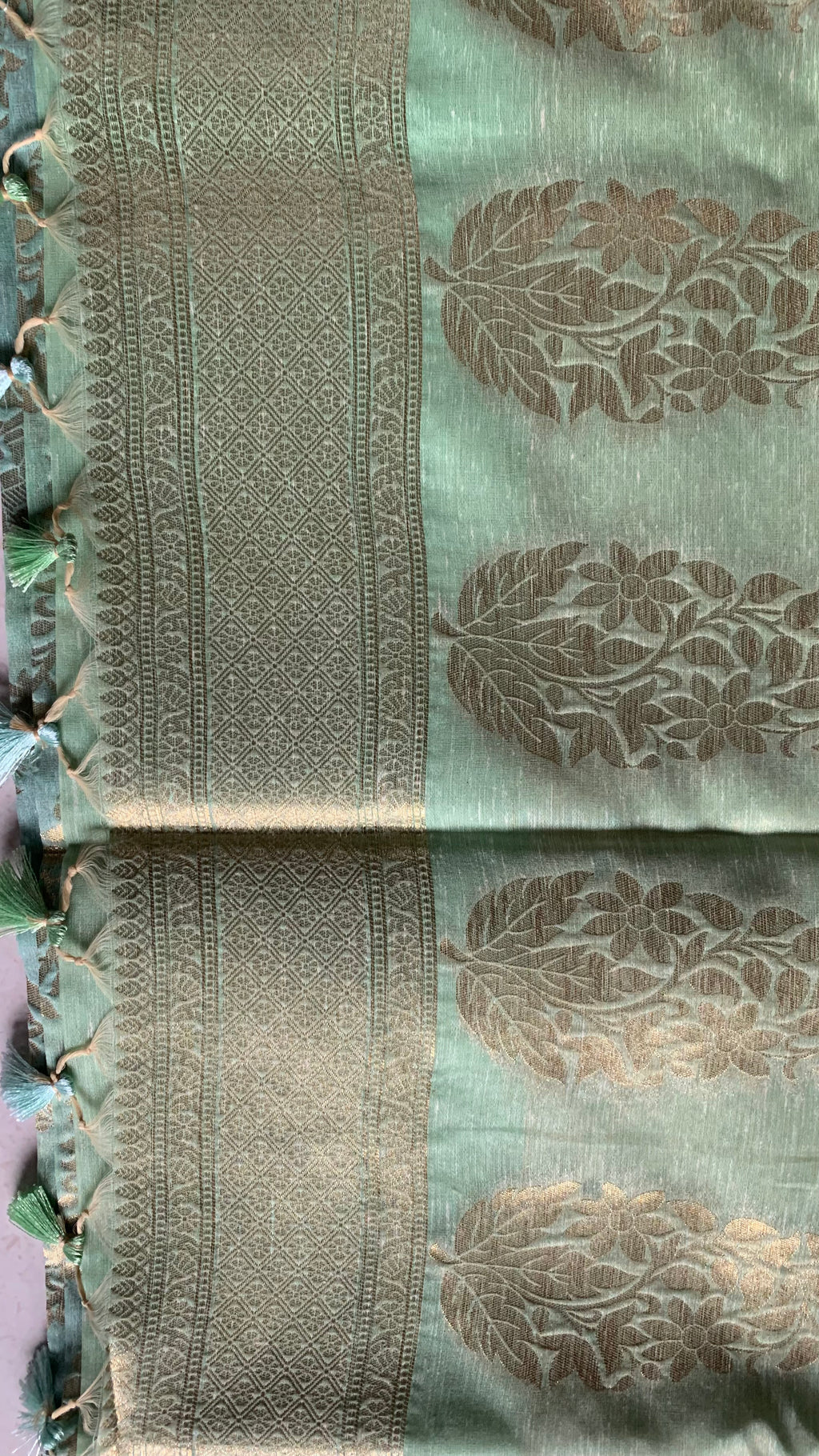 Mint Green Linen Silk Saree with Gold Floral Motifs & Tassel Edge